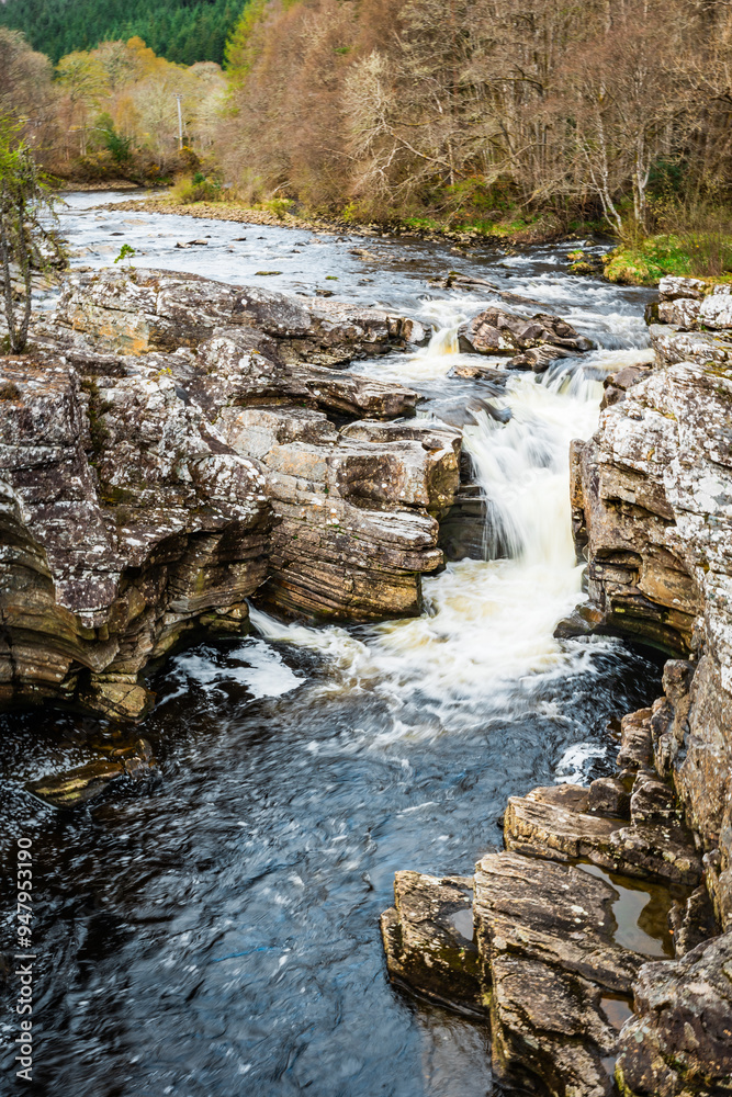 Obraz premium Rocky and Secluded Scottish Waterfall