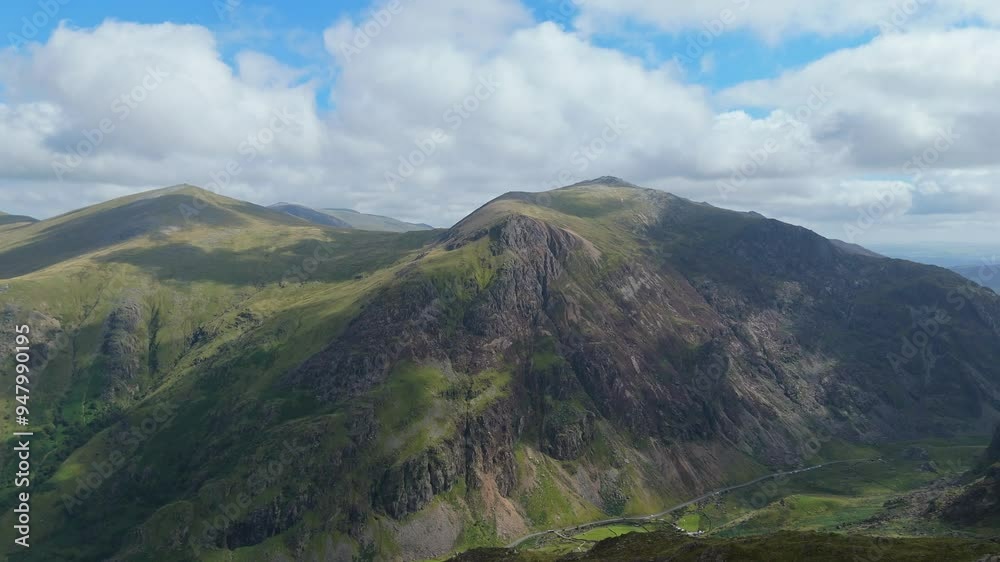 Aerial Drone View of Snowdonia National Park, Wales. Bird eye views on the Mountains Landscape in the Snowdonia national park. Aerial Drone View of Snowdonia National Park, Wales. Bird eye views on the Mountains Landscape in the Snowdonia national park.