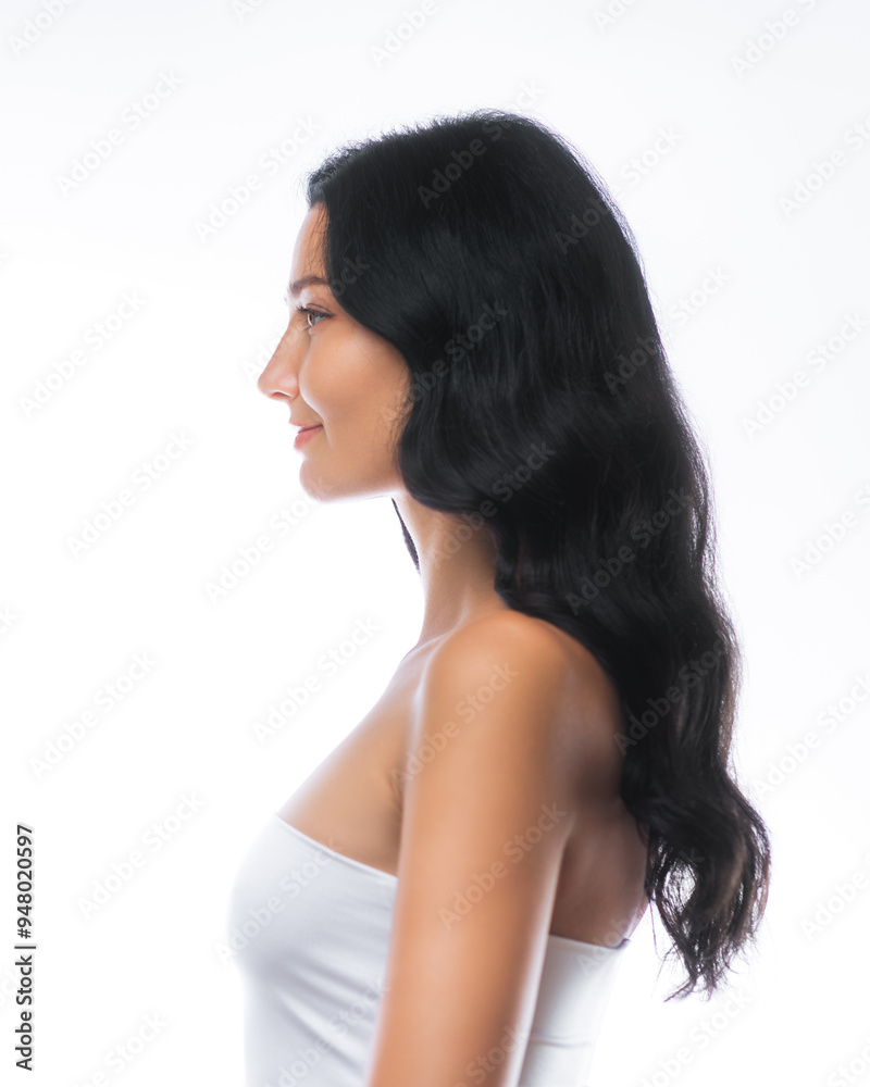 Naklejka premium Profile of Asian Woman with Long Black Hair in Studio