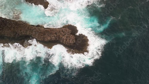 Aerial view of the beautiful rocky coast with crashing waves and turquoise water, Lomo Machin, La Palma, Canary Islands, Spain. photo