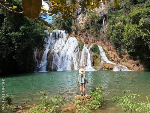 turista na cachoeira paraiso do cerrado, damianopolis, goias  photo