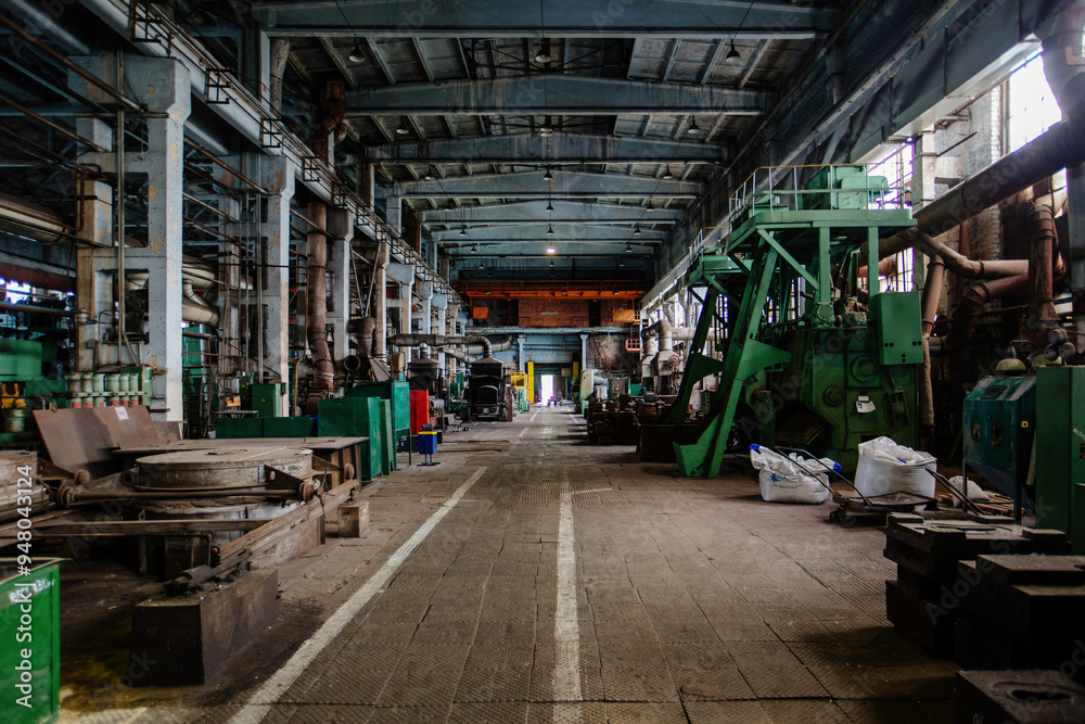 Heavy mechanical engineering factory production line. Interior of workshop Heavy mechanical engineering factory production line. Interior of workshop