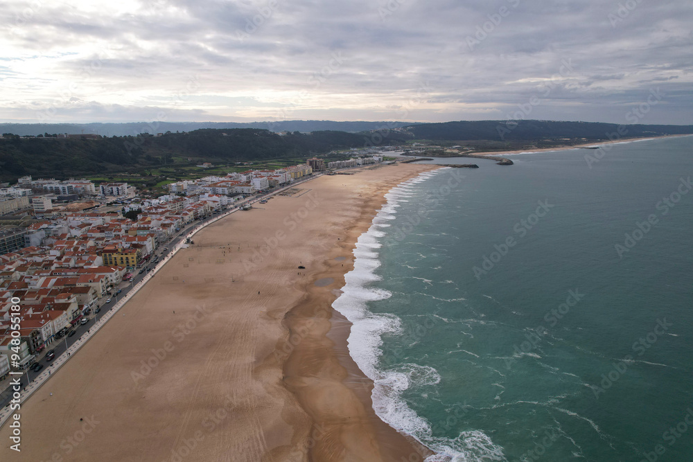 Beautiful aerial view of the large Nazare Beach. Portugal Beautiful aerial view of the large Nazare Beach. Portugal