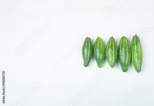 Potol is a small, green, Pointed Gourd that is native to India, also called Parval in Hindi and Putulika in Sanskrit. It is a vital summer vegetable in Bangladesh and West Bengal. Pointed Gourd.