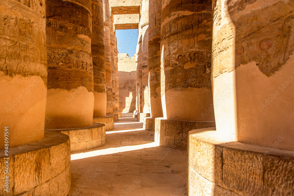 Discover the grandeur of Karnak's Hall of Columns, a vast hall supported by hundreds of towering pillars, creating a breathtaking sight that has amazed visitors for centuries.