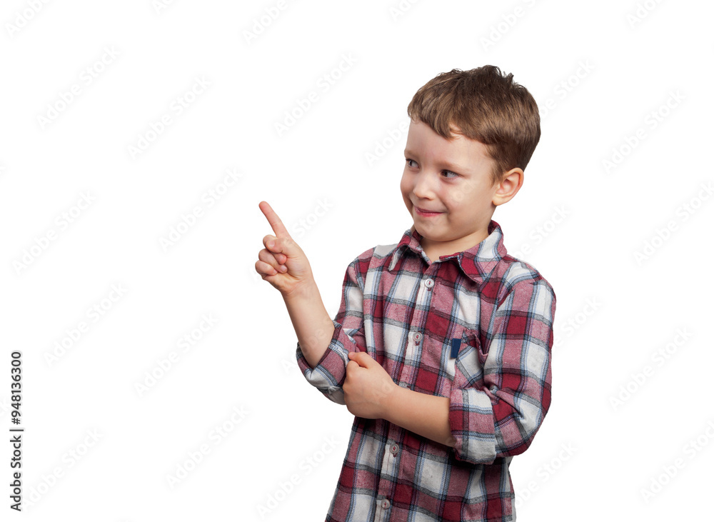A boy with a bright smile points his finger against a white background, expressing curiosity and enthusiasm in his clear gaze A boy with a bright smile points his finger against a white background, expressing curiosity and enthusiasm in his clear gaze