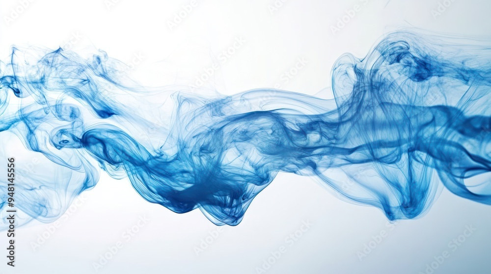 Flowing blue smoke creating an ethereal and abstract design. Flowing blue smoke creating an ethereal and abstract design.