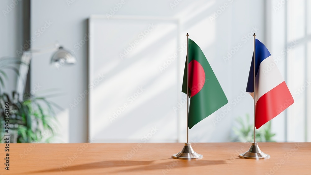 FLAGS OF BANGLADESH AND FRANCE ON TABLE