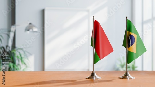 FLAGS OF BELARUS AND BRAZIL ON TABLE photo