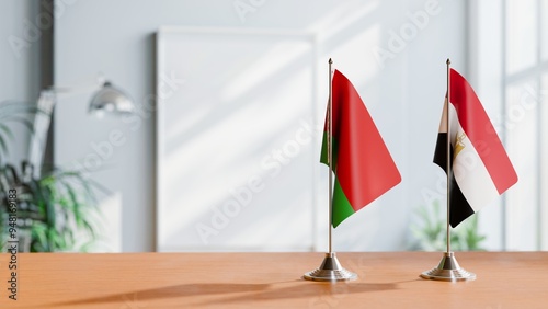 FLAGS OF BELARUS AND EGYPT ON TABLE photo