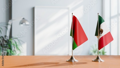 FLAGS OF BELARUS AND MEXICO ON TABLE photo