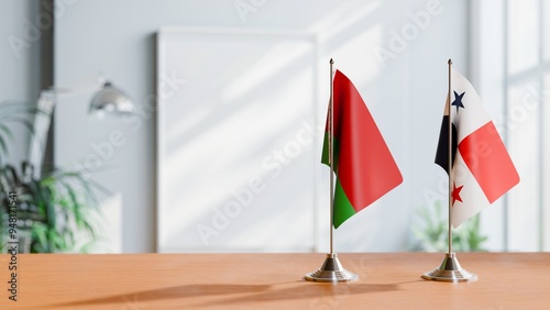 FLAGS OF BELARUS AND PANAMA ON TABLE photo