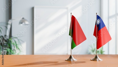 FLAGS OF BELARUS AND TAIWAN ON TABLE photo