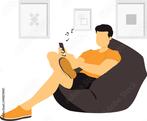 The boy is listening to music on the phone.