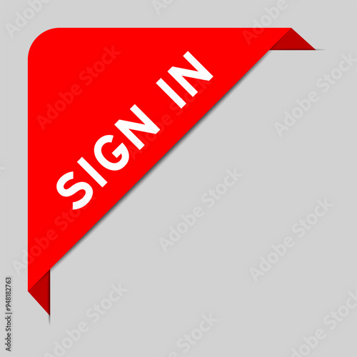 Red color of corner label banner with word sign in on gray background