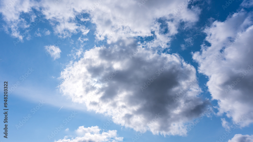 Fluffy clouds and a blue sky Fluffy clouds and a blue sky