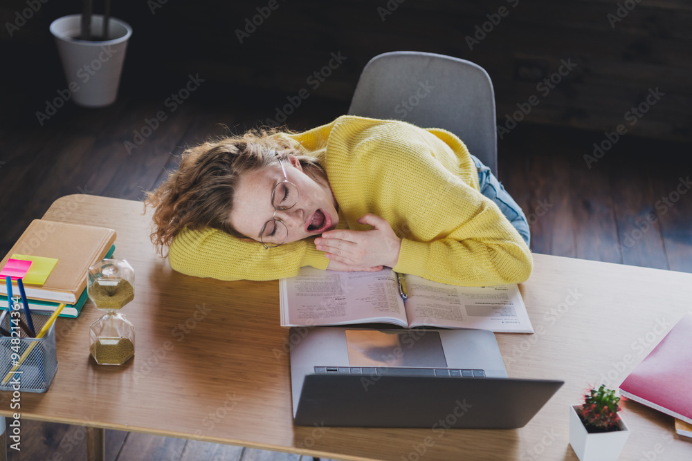 Photo of cute young female yawn sleeping lying table wear yellow sweater comfortable modern loft cozy office interior indoors workspace Photo of cute young female yawn sleeping lying table wear yellow sweater comfortable modern loft cozy office interior indoors workspace