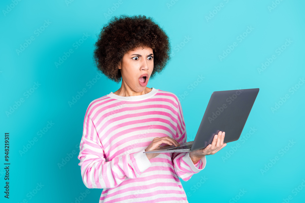 Photo of pretty young woman use laptop wear pullover isolated on teal color background Photo of pretty young woman use laptop wear pullover isolated on teal color background