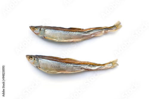 Small dried fish isolated on white background. Top view