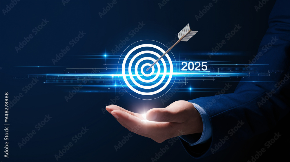 A business professional holding a glowing target symbolizing goals for the year 2025, representing achievement and planning. A business professional holding a glowing target symbolizing goals for the year 2025, representing achievement and planning.