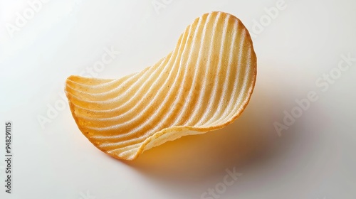 Single ridged potato chip on a white background Created with Generative AI. photo