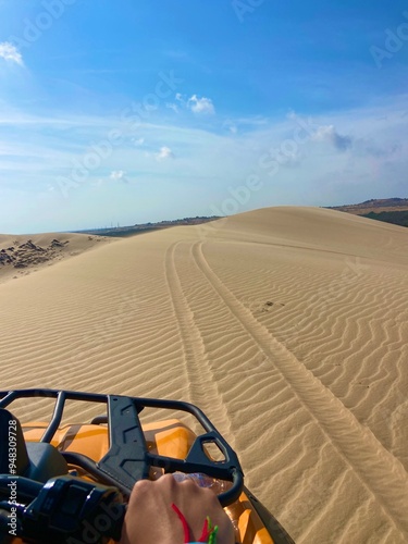 Quad biking on the dunes of mui ne, vietnam photo