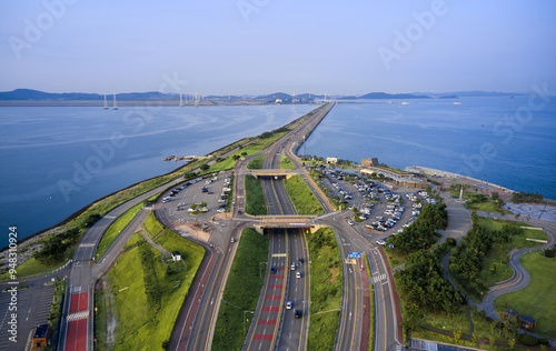 Ansan-si, Gyeonggi-do, South Korea - September 12, 2021: Aerial view of Sihwa Narae Rest Area at Siwha Tide Embankment of Sihwa Lake photo