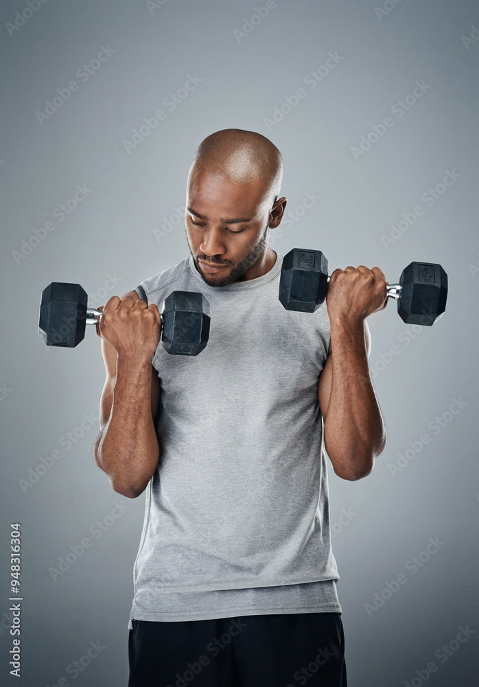 Black man, dumbbells and muscle training in studio, sports performance and lift on gray background. Male person, strong bicep challenge and weightlifting for power, bodybuilder and fitness workout Black man, dumbbells and muscle training in studio, sports performance and lift on gray background. Male person, strong bicep challenge and weightlifting for power, bodybuilder and fitness workout