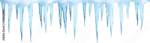 A view of striking icicles shimmering in sunlight, showcasing intricate ice formations against a snowy backdrop.