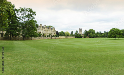 Oxford, England, the United Kingdom - June 20, 2018: Summer view of lawn and garden with building of Oxford University