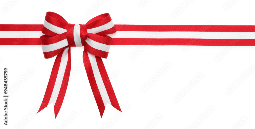 Ribbon with bow in colors of Austrian flag isolated on white Ribbon with bow in colors of Austrian flag isolated on white