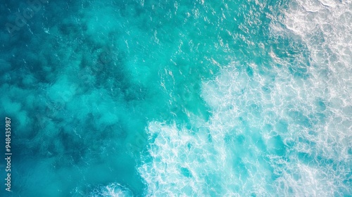 Aerial view of beautiful tropical turquoise ocean sea waters with shallow waves. Vibrant bright sunny day in summer wallpaper.