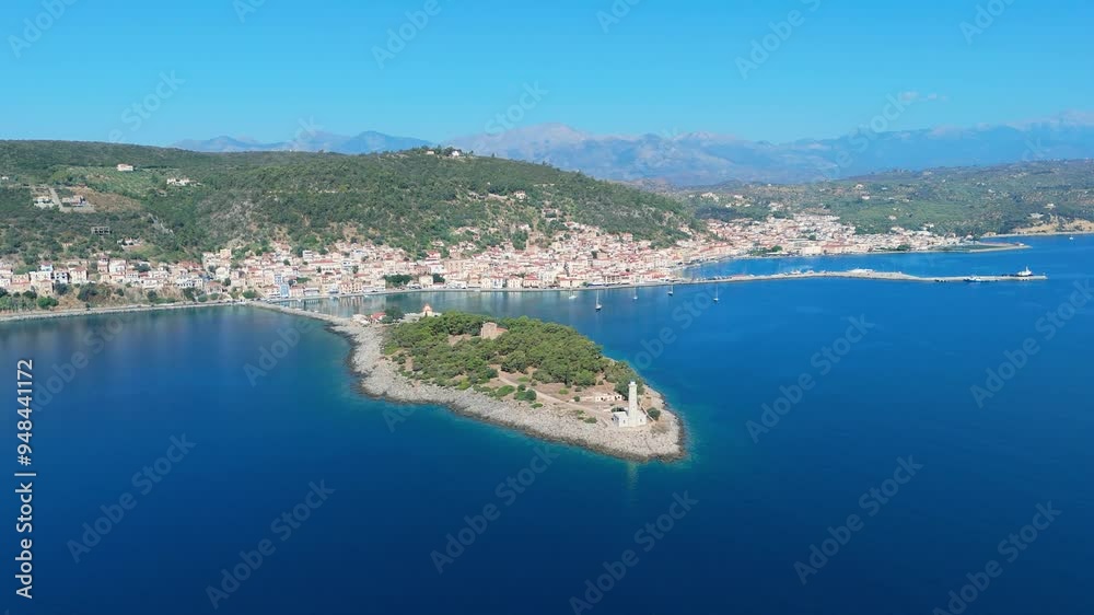 greece peloponnese region gytheio town lighthouse coastal houses chapel and boats aerial view 4k footage greece peloponnese region gytheio town lighthouse coastal houses chapel and boats aerial view 4k footage