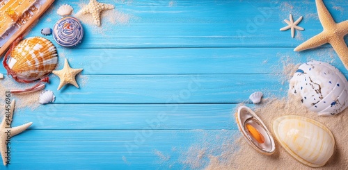 A straw hat with an exotic cocktail and sunglasses on a sand beach