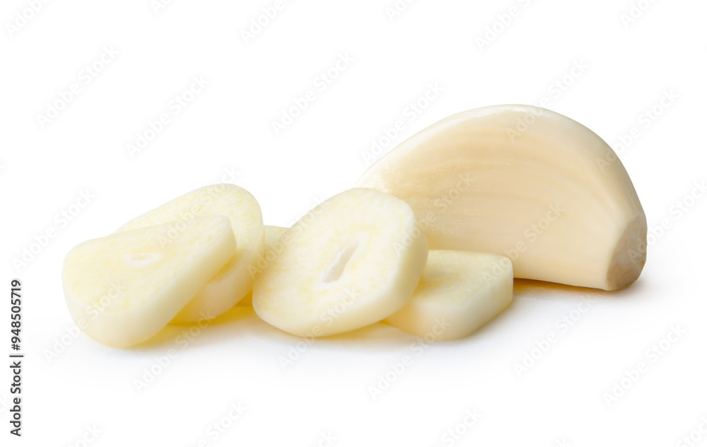 Fresh peeled garlic clove with slices or pieces in stack isolated on white background with clipping path Fresh peeled garlic clove with slices or pieces in stack isolated on white background with clipping path