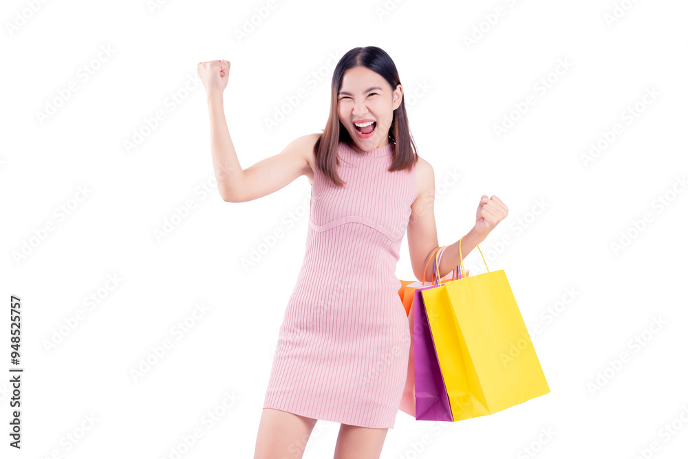 Joyful woman celebrates while holding vibrant shopping bags against a matching pink background. The image captures the excitement and satisfaction of a successful shopping experience Joyful woman celebrates while holding vibrant shopping bags against a matching pink background. The image captures the excitement and satisfaction of a successful shopping experience