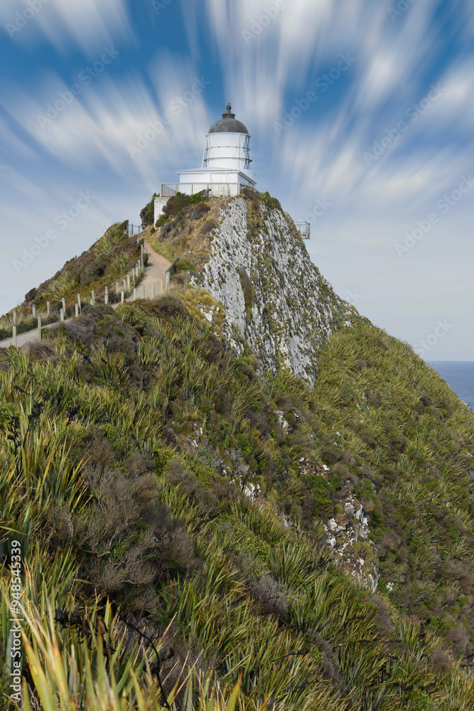 panoramic view to the Nugget Point Lighthouse, located in the Catlins area on the Southern Island Coast of New Zealand, Otago region