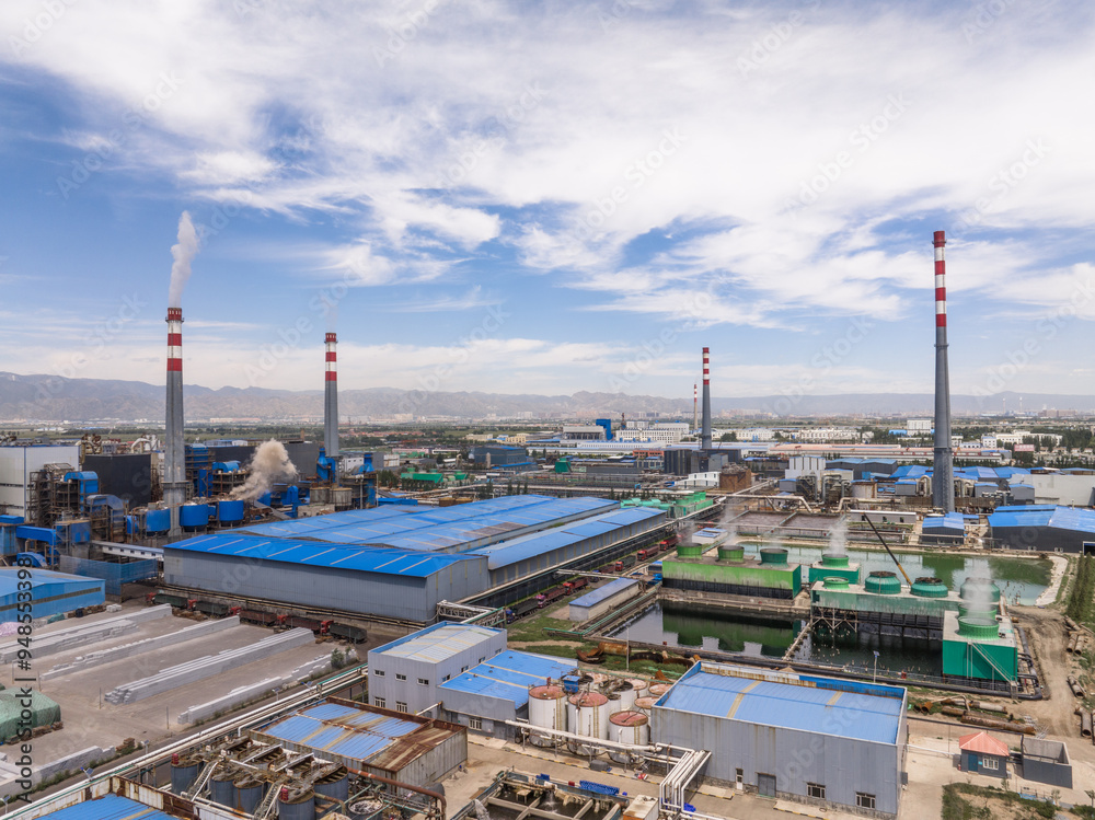 view of power station in blue sky