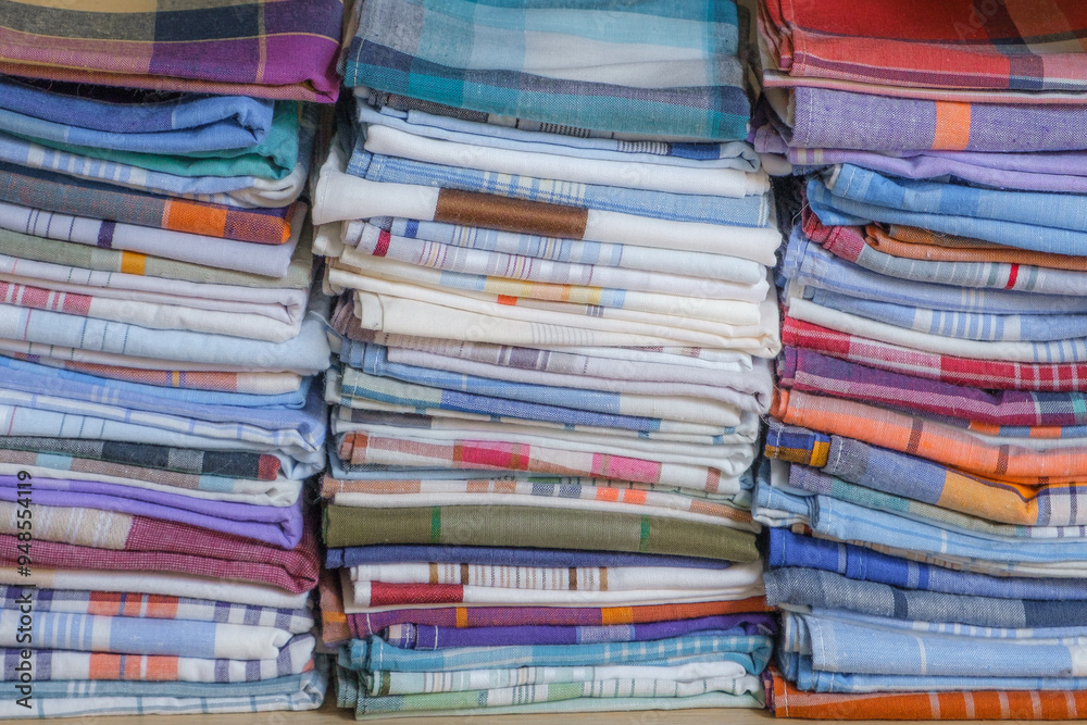 Stacks of vintage stripped handkerchiefs for men.