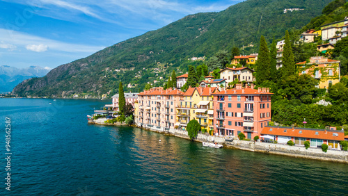 An aerial view of Bellano, a picturesque village on the eastern shore of Lake Como, Italy, captured by a drone. This charming lakeside town is known for its stunning scenery, narrow streets photo