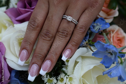 bride hands ring and flower 