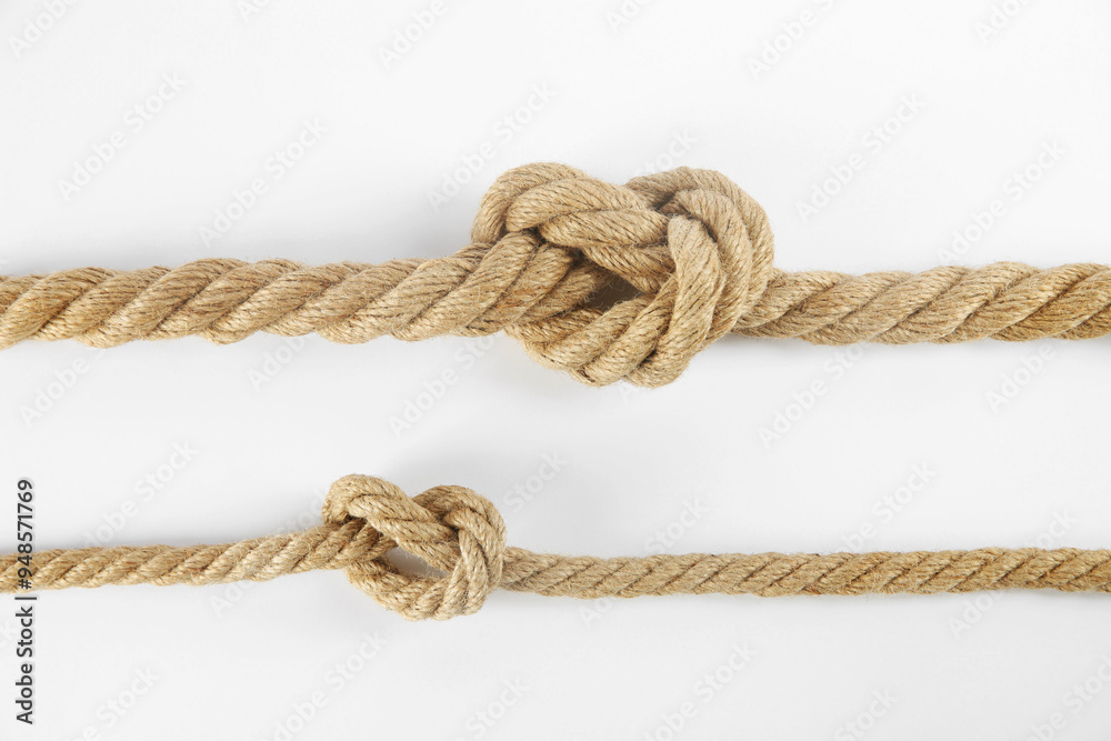 Hemp ropes with knots isolated on white, top view Hemp ropes with knots isolated on white, top view