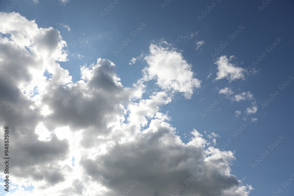 Picturesque view of blue sky with fluffy clouds Picturesque view of blue sky with fluffy clouds
