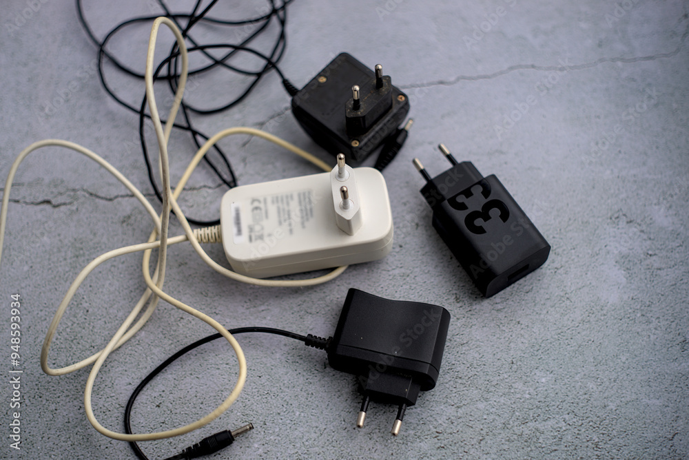 Black and white mobile phone chargers