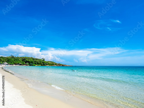 Seascape view with white sand, quiet beach, clear sea water, blue sky in summer of Koh Samet (Samet Isalnd) in Thailand
