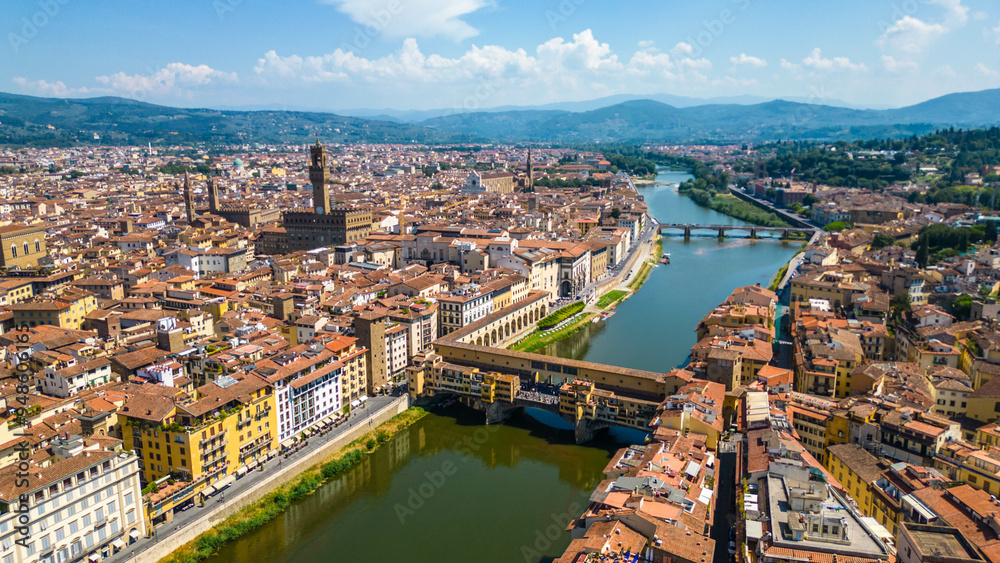 Obraz premium An aerial view of Florence, Italy, captured by a drone, highlighting the city's stunning Renaissance architecture and iconic landmarks. Florence, the cradle of the Renaissance, is renowned for it