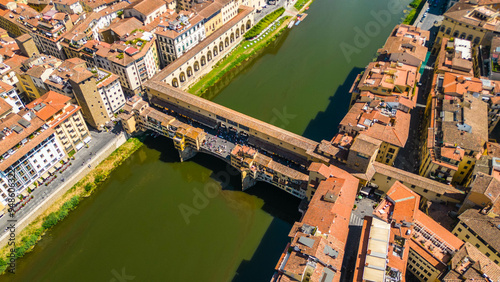 An aerial view of Florence, Italy, captured by a drone, highlighting the city's stunning Renaissance architecture and iconic landmarks. Florence, the cradle of the Renaissance, is renowned for it photo