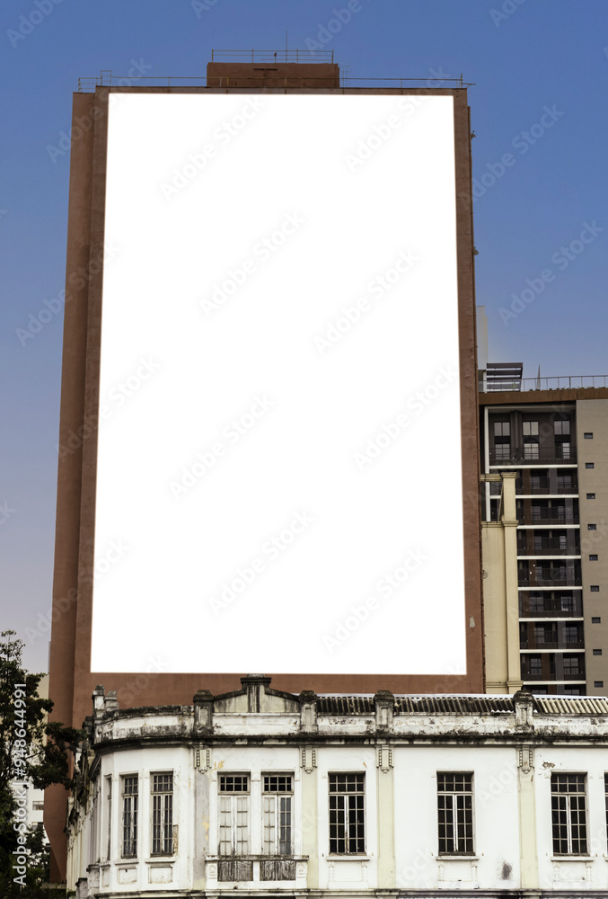 Large blank billboards on facade of the building on street in the city in Brazil, mockup billboard Large blank billboards on facade of the building on street in the city in Brazil, mockup billboard