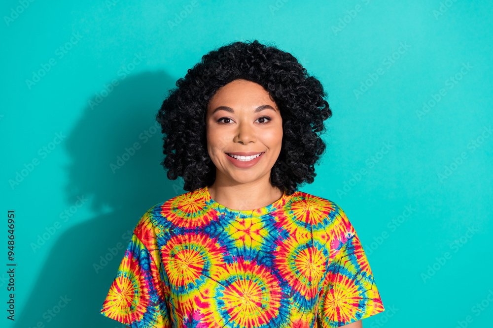 Photo of lovely pretty woman wear stylish print clothes isolated on cyan color background Photo of lovely pretty woman wear stylish print clothes isolated on cyan color background