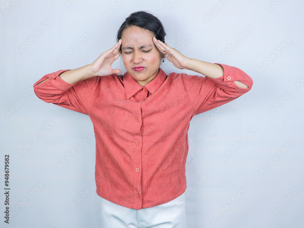 distressed young asian businesswoman, female lady touching head, rubbing temples, has migraine distressed young asian businesswoman, female lady touching head, rubbing temples, has migraine